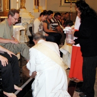 Deacon Harold washes feet on Holy Thursday